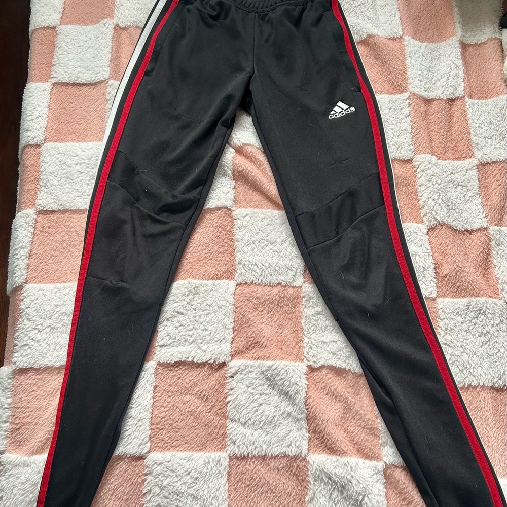 Adidas Women's Black Joggers with Red, White, and Blue Stripes and zippers